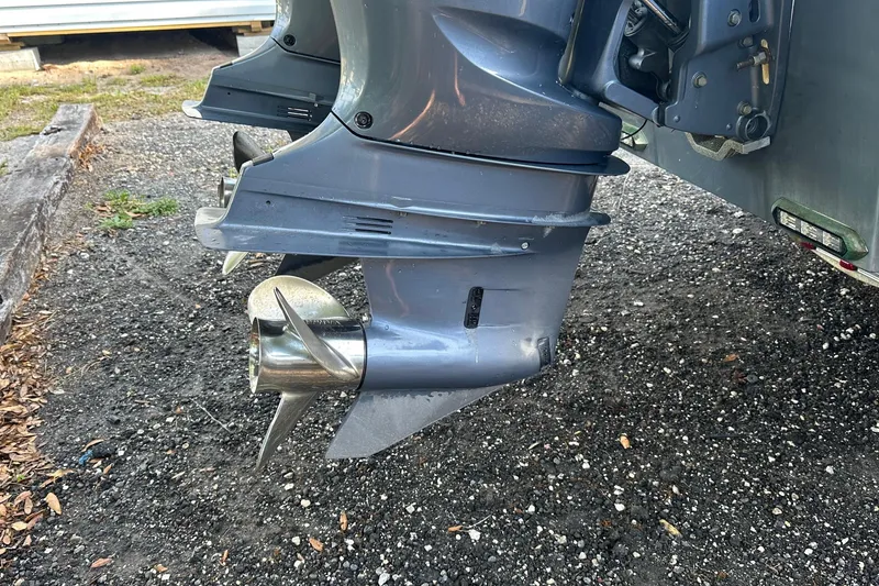 Slide: The Image of 2017 Cape Horn 32 T boat propellers on gravel surface. - 17