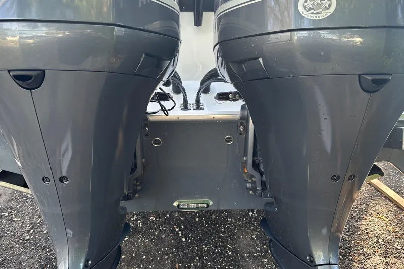 Slide: The Image of 2017 Cape Horn 32 T boat with dual outboard motors, rear view. - 20