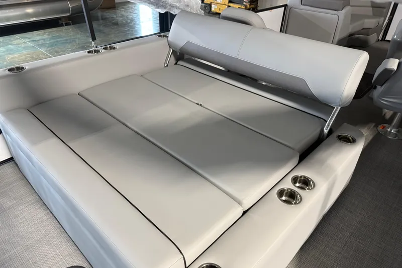 Slide: The Image of Luxurious seating area on 2026 Manitou 23 Aurora SL VPII pontoon boat. - 10