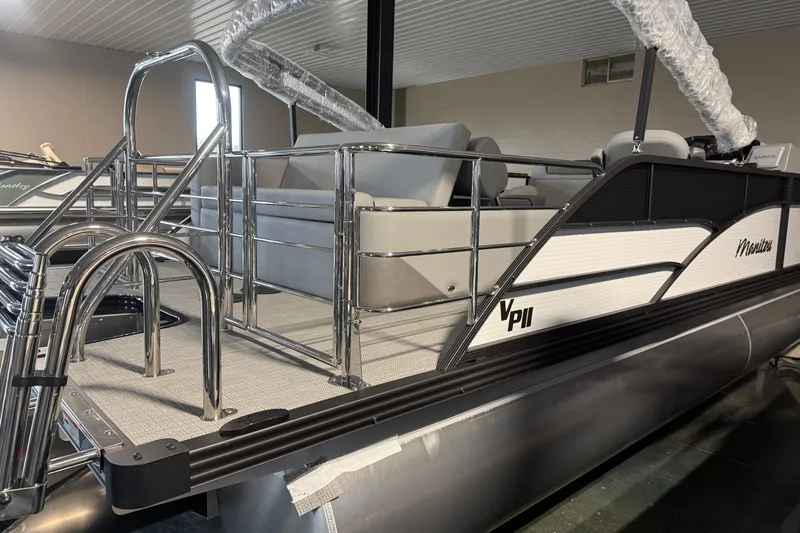 Slide: The Image of 2026 Manitou 23 Aurora SL VPII pontoon boat with sleek design and modern features. - 7