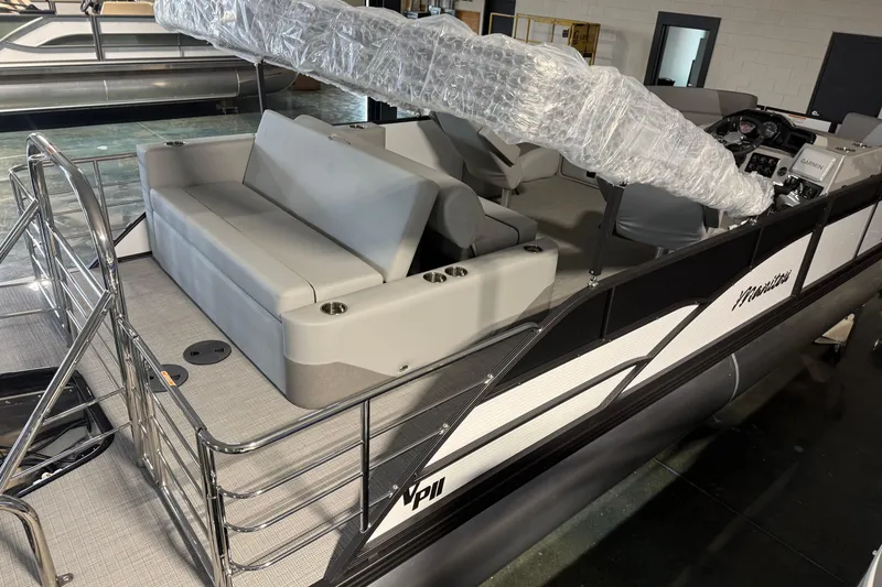 Slide: The Image of 2026 Manitou 23 Aurora SL VPII pontoon boat with sleek seating and modern design. - 8