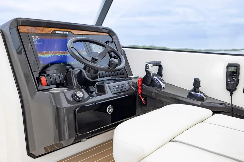 Slide: The Image of Manufacturer Provided Image: 2026 Pursuit DC 286 Dual Console helm with advanced controls and navigation display. - 6