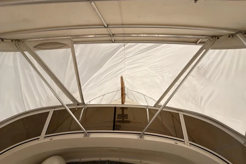 Slide: The Image of 1999 Silverton 422 Motor Yacht canopy and frame, viewed from below. - 13