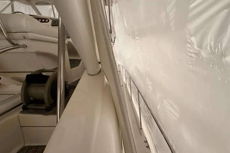 Slide: The Image of Interior view of a 1999 Silverton 422 Motor Yacht, showcasing seating and equipment. - 5