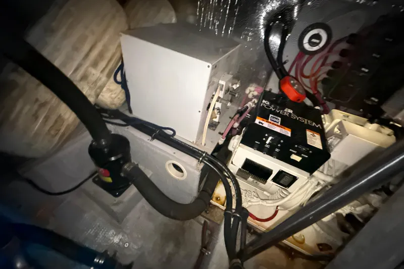 Slide: The Image of Engine room of a 1999 Silverton 422 Motor Yacht with power system components. - 75