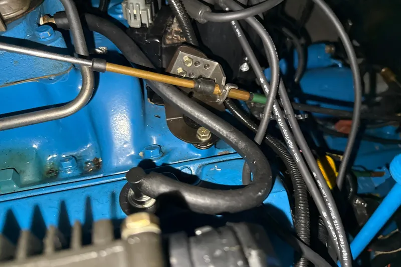 Slide: The Image of Close-up of engine components in a 1999 Silverton 422 Motor Yacht. - 87