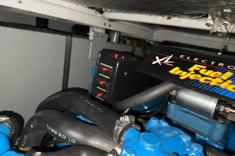 Slide: The Image of Engine compartment of a 1999 Silverton 422 Motor Yacht with fuel injection system. - 89