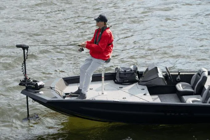 Slide: The Image of Manufacturer Provided Image: Man fishing on 2026 Smoker Craft Viper XR 165 boat in open water. - 11
