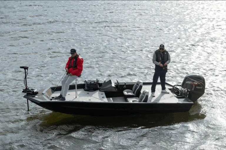 Slide: The Image of Manufacturer Provided Image: 2026 Smoker Craft Viper XR 165 boat with two people fishing on a lake. - 12