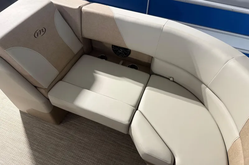 Slide: The Image of Luxurious seating on 2026 Manitou 23 AURORA RF VPII 575 boat, featuring beige upholstery. - 6