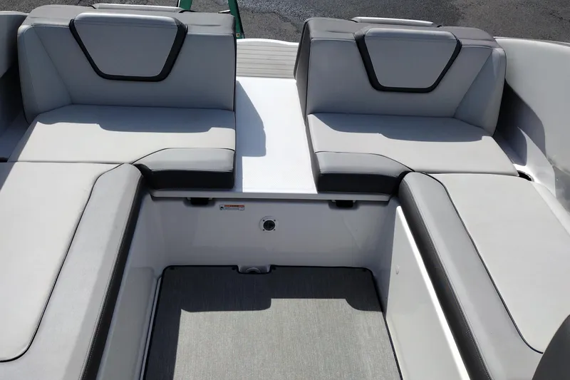 Slide: The Image of 2023 Yamaha AR250 boat interior with gray seating and modern design. - 17