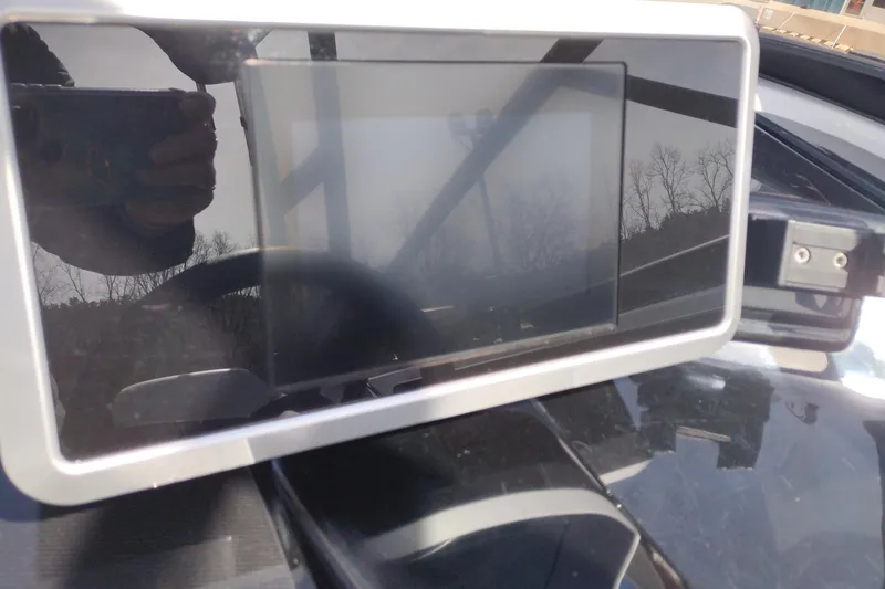 Slide: The Image of Close-up of a 2023 Yamaha AR250 dashboard display screen. - 18