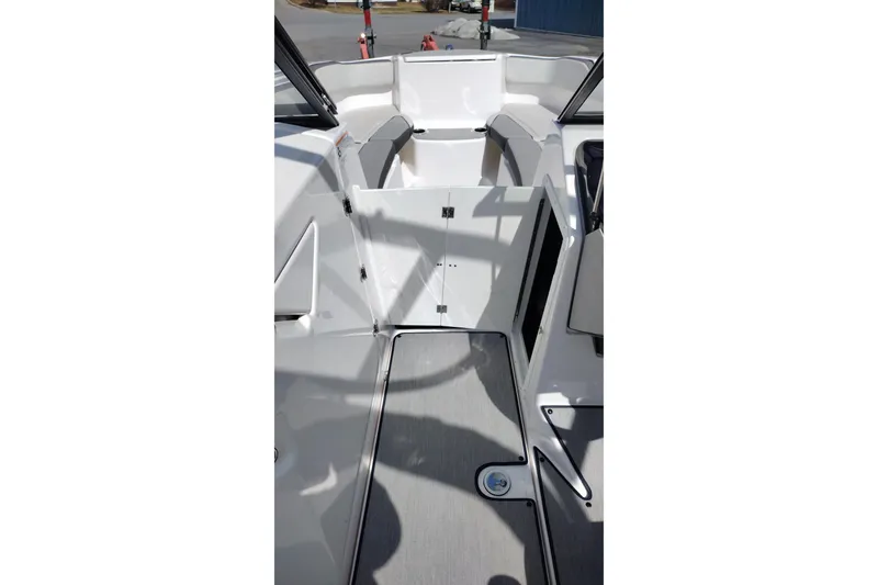 Slide: The Image of 2023 Yamaha AR250 boat interior with open deck and seating area. - 21