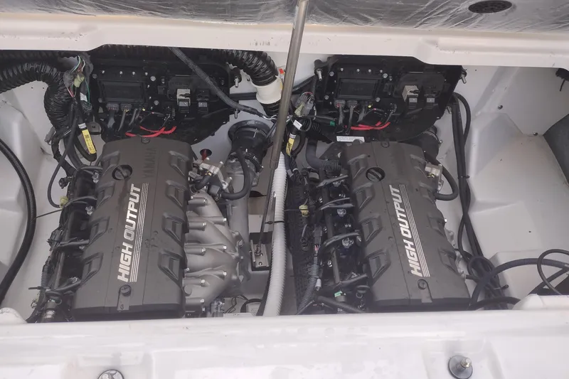 Slide: The Image of 2023 Yamaha AR250 high output engines in a boat's engine compartment. - 22