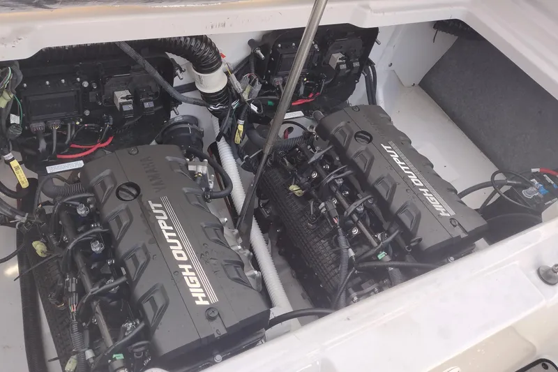 Slide: The Image of 2023 Yamaha AR250 engine compartment with high output engines and wiring. - 23