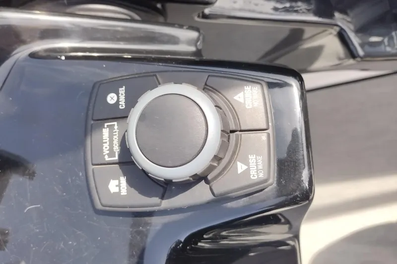 Slide: The Image of Control panel of 2023 Yamaha AR250 boat with volume and cruise controls. - 29