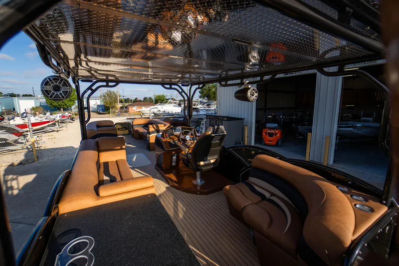 Slide: The Image of Luxurious 2026 Aloha Paradise 300 Sundeck boat with spacious seating and modern design. - 15