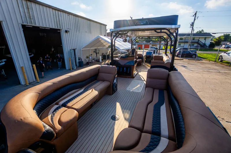 Slide: The Image of 2026 Aloha Paradise 300 Sundeck boat with luxurious seating and modern design. - 17