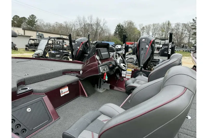 Slide: The Image of 2022 Nitro Z20 Pro boat interior with dual seats and advanced dashboard controls. - 5