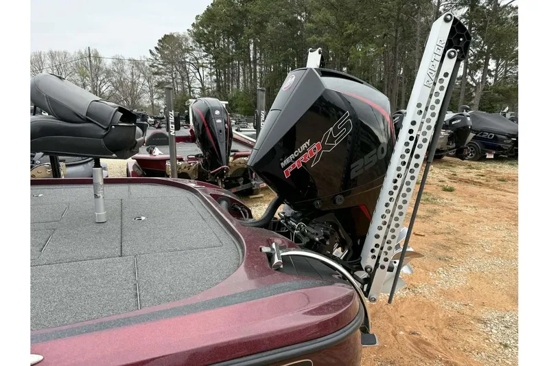 Slide: The Image of 2022 Nitro Z20 Pro boat with Mercury Pro XS 250 engine in a wooded area. - 6