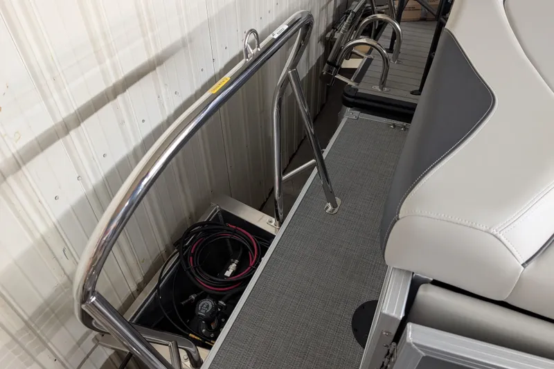 Slide: The Image of 2026 Sylvan Mirage 820 Cruise boat interior with seating and railing details. - 8