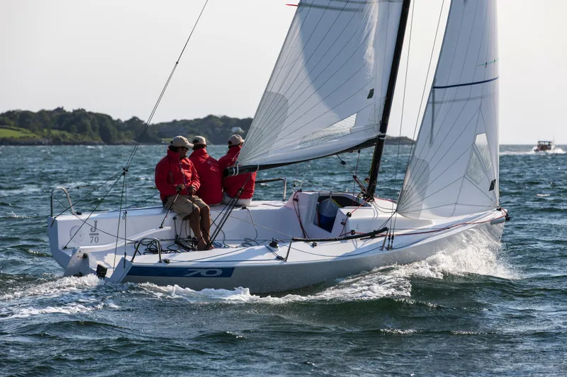 Slide: The Image of Interior view of a 2013 J Boats J/70 sailboat under blue tarp. - 12