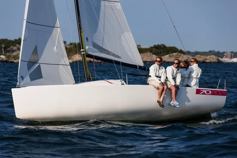 Slide: The Image of Interior view of a 2013 J Boats J/70 sailboat under a blue tarp. - 13