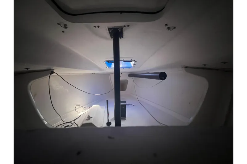 Slide: The Image of Interior view of a 2013 J Boats J/70 sailboat cabin with minimalistic design. - 8