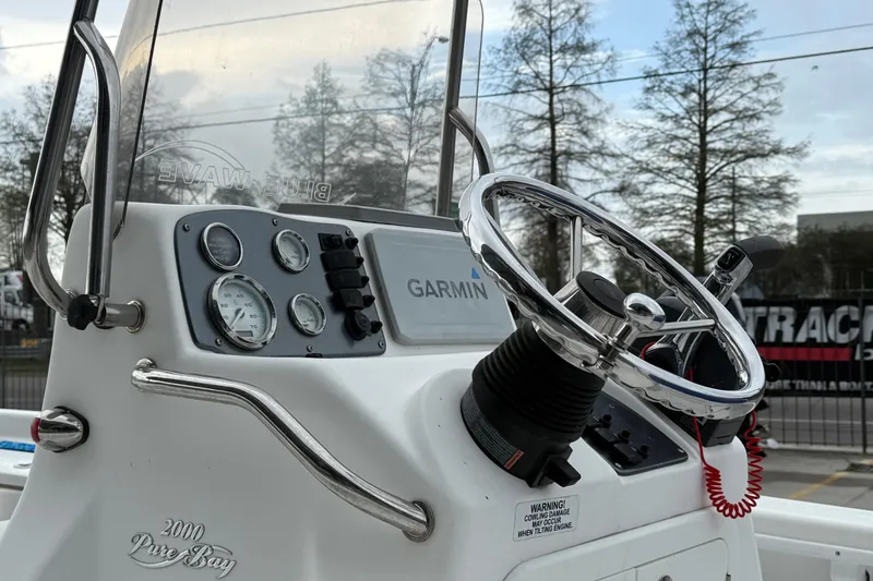 Slide: The Image of Control panel of a 2015 Blue Wave 2000 PureBay boat with Garmin navigation. - 10
