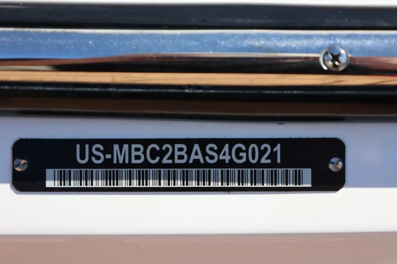 Slide: The Image of 2021 MasterCraft NXT24 boat identification plate with serial number and barcode. - 13
