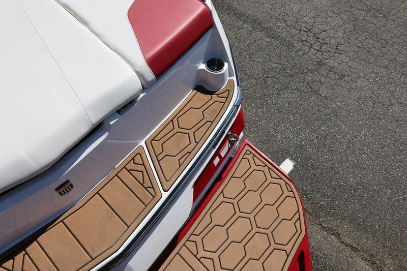 Slide: The Image of 2021 MasterCraft NXT24 boat with stylish deck and seating design. - 17