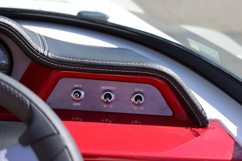 Slide: The Image of Dashboard controls of a 2021 MasterCraft NXT24 boat with navigation and lighting switches. - 43