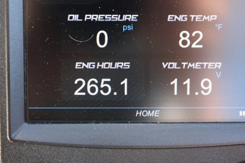 Slide: The Image of Dashboard display of a 2021 MasterCraft NXT24 showing engine metrics and hours. - 46