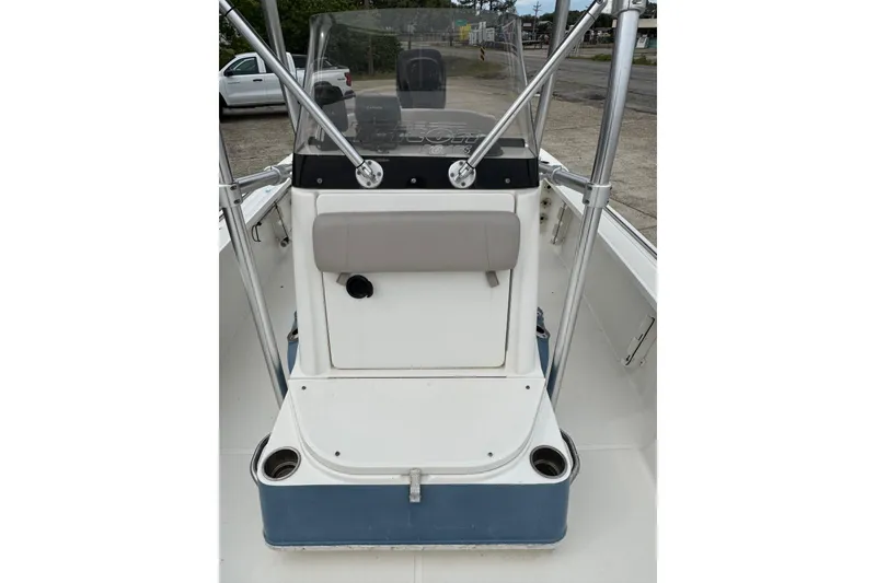 Slide: The Image of 2010 Triton 240 LTS Pro boat console with windshield and seating. - 18