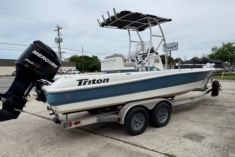 Slide: The Image of 2010 Triton 240 LTS Pro boat on trailer with Mercury Pro XS engine. - 3