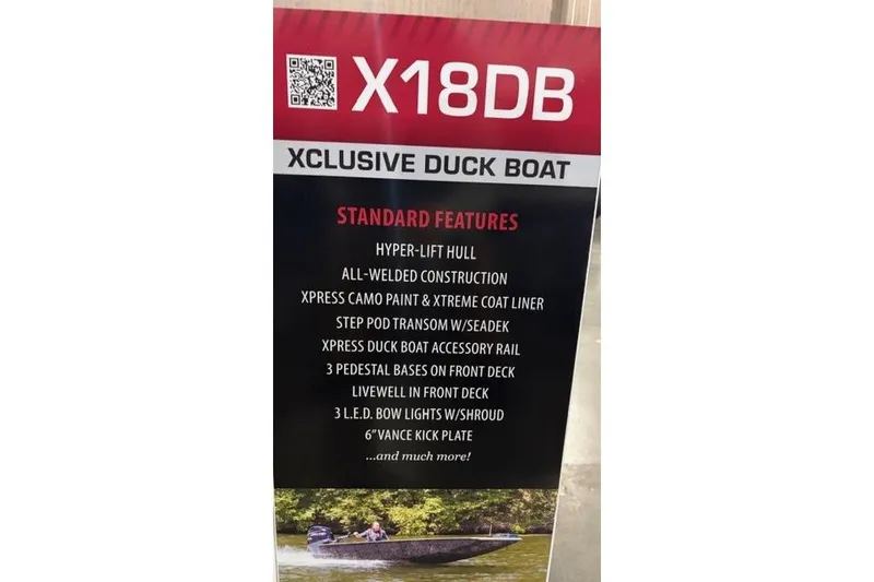 Slide: The Image of 2026 Xpress X18DB Xclusive Duck Boat features list on display board. - 9