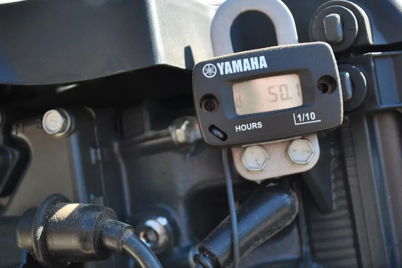 Slide: The Image of Yamaha hour meter on a 1976 Boston Whaler 15 boat engine. - 19
