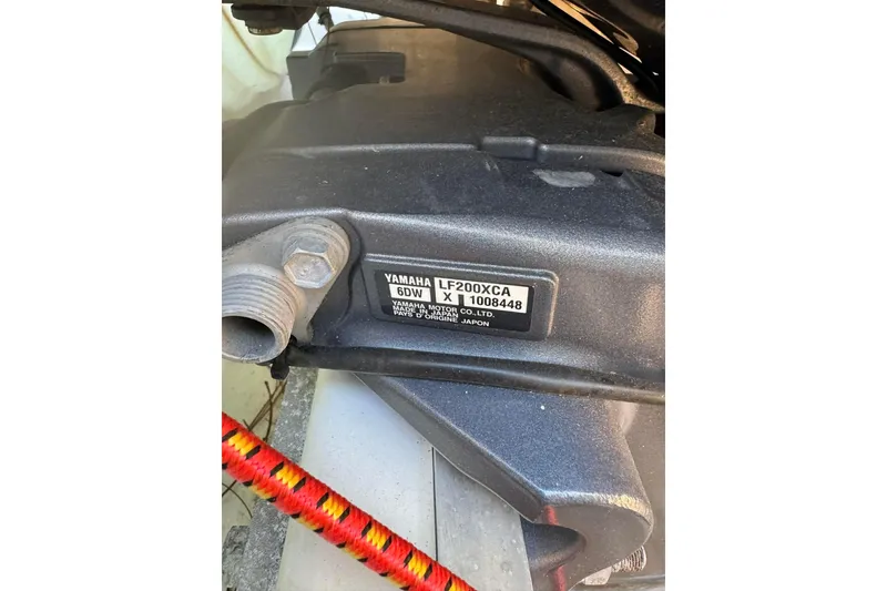 Slide: The Image of Close-up of Yamaha LF200XCA engine part on 2020 Sea Hunt Gamefish 27 boat. - 11