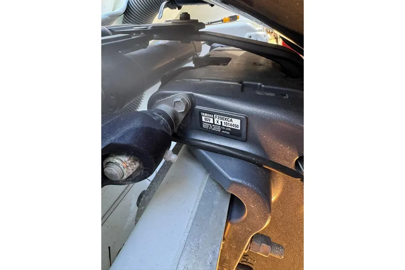 Slide: The Image of Close-up of Yamaha F200XCA engine part on 2020 Sea Hunt Gamefish 27 boat. - 12