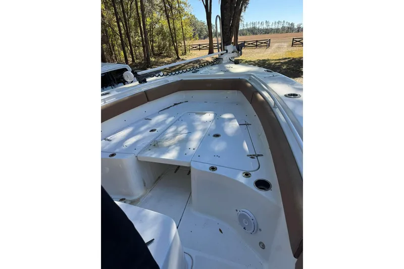 Slide: The Image of 2020 Sea Hunt Gamefish 27 Forward Seating boat with spacious deck and seating area. - 14