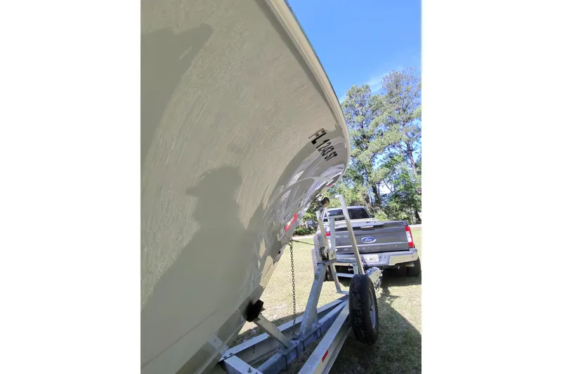 Slide: The Image of Interior of 2020 Sea Hunt Gamefish 27 boat with storage and marine toilet. - 20