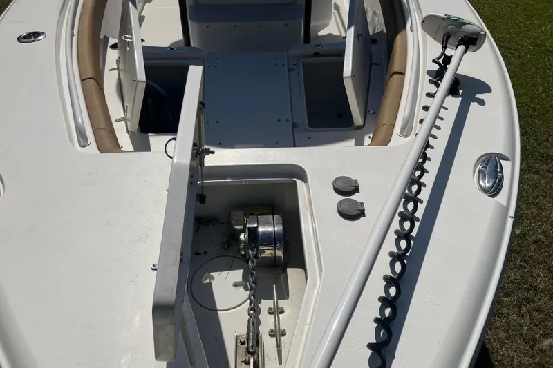 Slide: The Image of 2020 Sea Hunt Gamefish 27 Forward Seating boat deck with storage compartments and anchor system. - 26