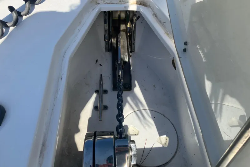 Slide: The Image of Anchor chain compartment of a 2020 Sea Hunt Gamefish 27 Forward Seating boat. - 28