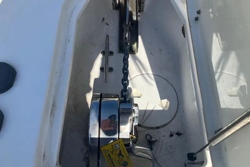 Slide: The Image of Anchor chain and winch on 2020 Sea Hunt Gamefish 27 Forward Seating boat. - 29
