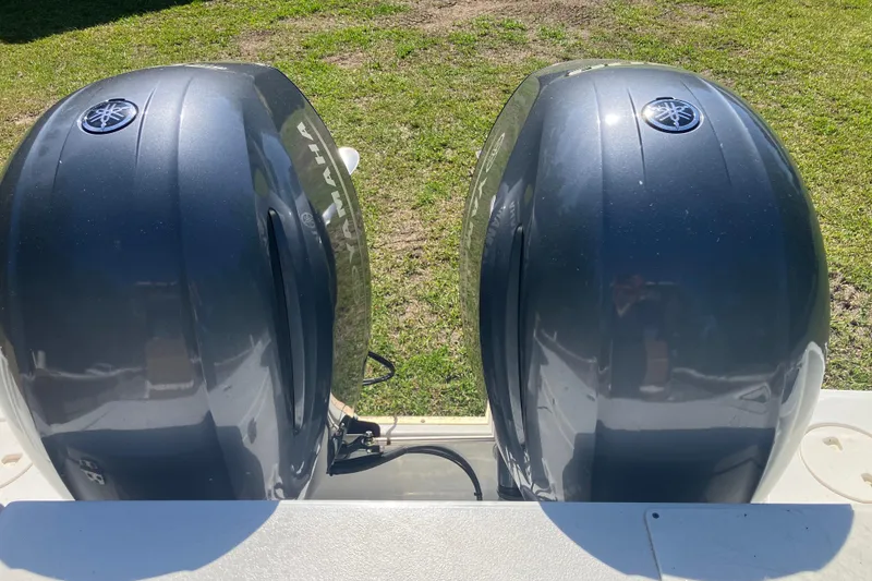 Slide: The Image of Twin Yamaha outboard engines on a 2020 Sea Hunt Gamefish 27 boat. - 34