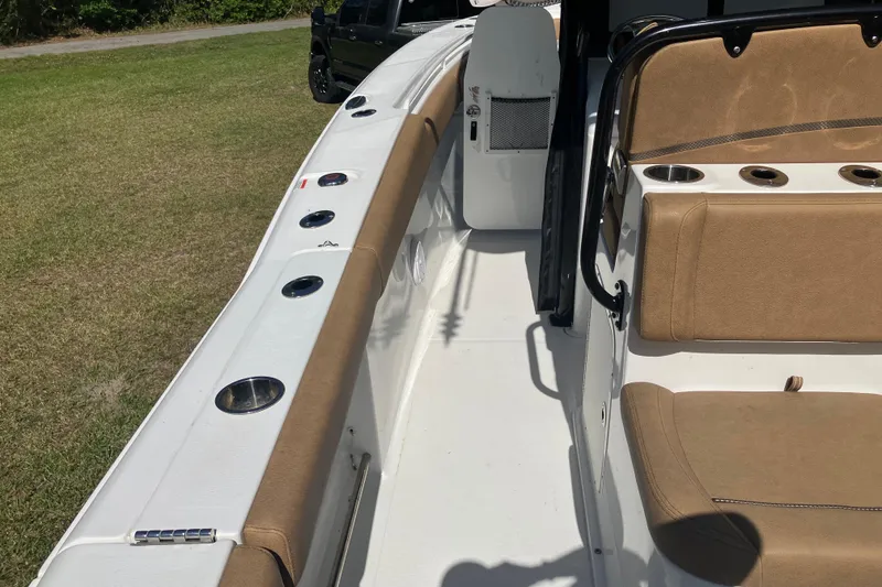 Slide: The Image of 2020 Sea Hunt Gamefish 27 boat interior with forward seating and cup holders. - 37