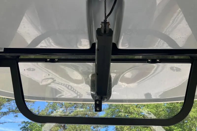 Slide: The Image of 2020 Sea Hunt Gamefish 27 Forward Seating, view of T-top structure and sky. - 39