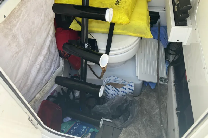 Slide: The Image of Interior of 2020 Sea Hunt Gamefish 27 boat with storage and marine toilet. - 41