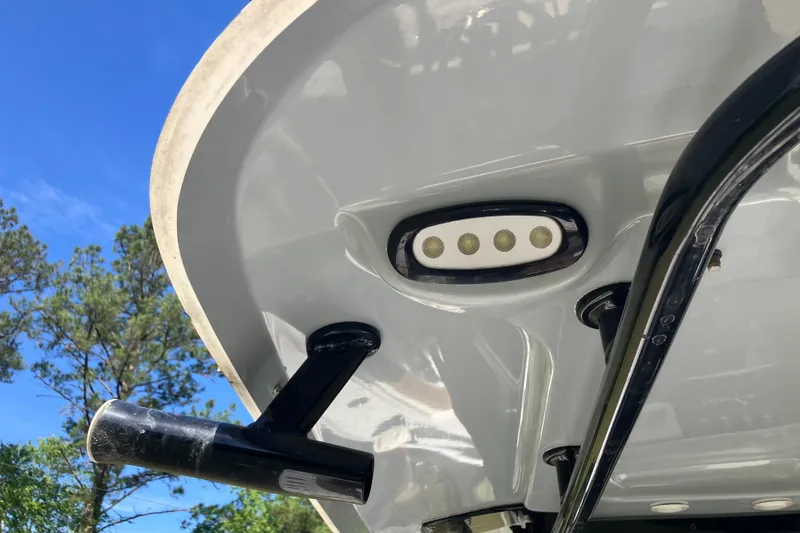 Slide: The Image of 2020 Sea Hunt Gamefish 27 boat detail with LED lights and rod holder. - 48