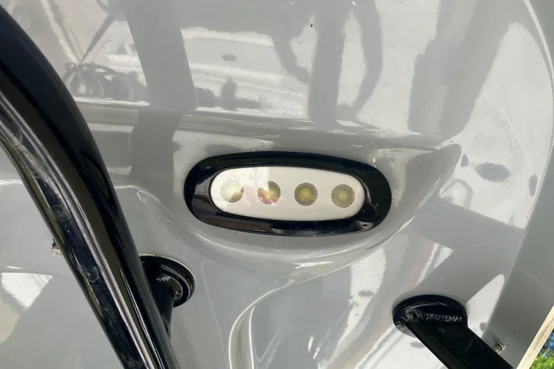 Slide: The Image of LED light on a 2020 Sea Hunt Gamefish 27 Forward Seating boat. - 49